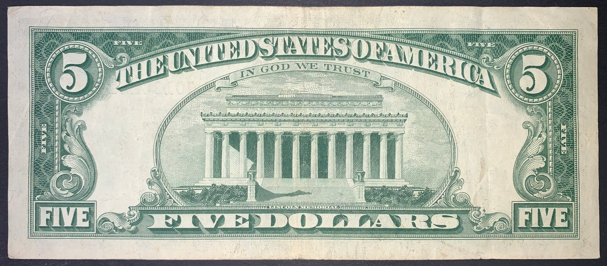 back of US 5 Dollars 1963 P-383 VF Red Treasury Seal collectible vintage american banknote with Lincoln Memorial