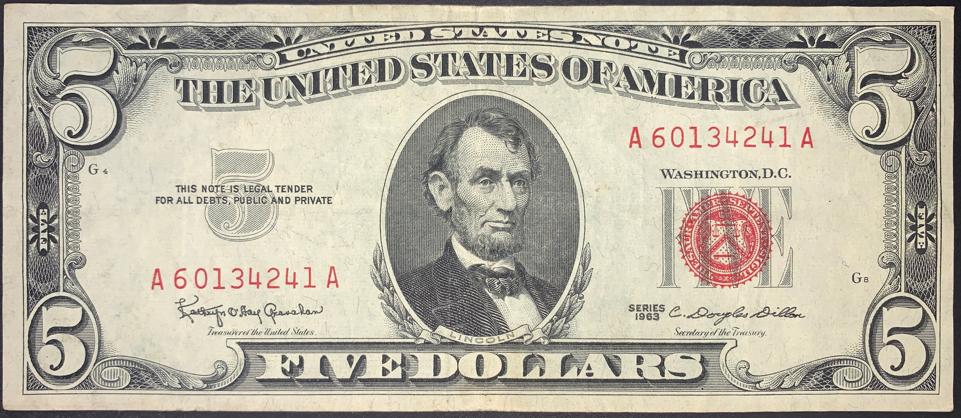 front of US 5 Dollars 1963 P-383 VF Red Treasury Seal collectible vintage american banknote with portrait of Abraham Lincoln and red Treasury Seal