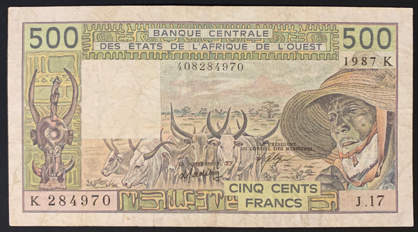 Western African States, Senegal 500 Francs 1987 P-706Kj VF vintage collectible banknote with wooden carved mask, herd of Zebu and a Herdsman