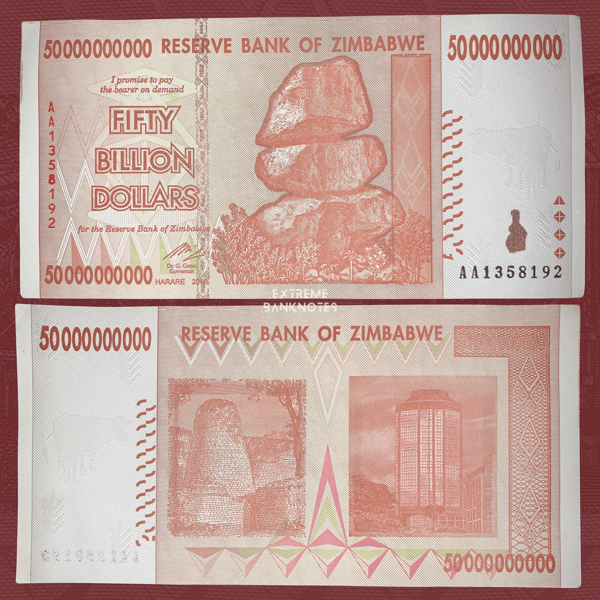 Authentic Zimbabwe 50 Billion Dollars banknote 2008 P-85 featuring Chiremba Balancing Rocks on the obverse and traditional grain storage with Reserve Bank headquarters on the reverse.
