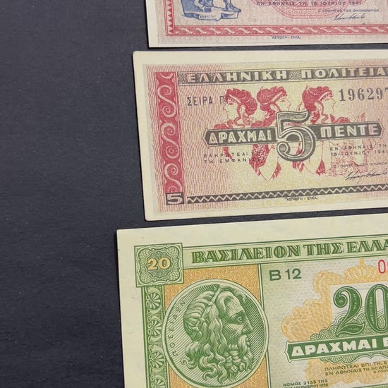 Front view of an uncirculated WWII era Greek banknote bundle featuring a 1941 1 Drachma, 1941 5 Drachmai, and 1940 20 Drachmai with classical art and Poseidon.
